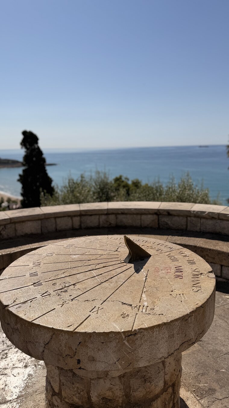 A stone sundial overlooking the Mediterranean